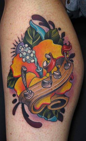 pics of music note tattoos. -music-notes-color-leg-